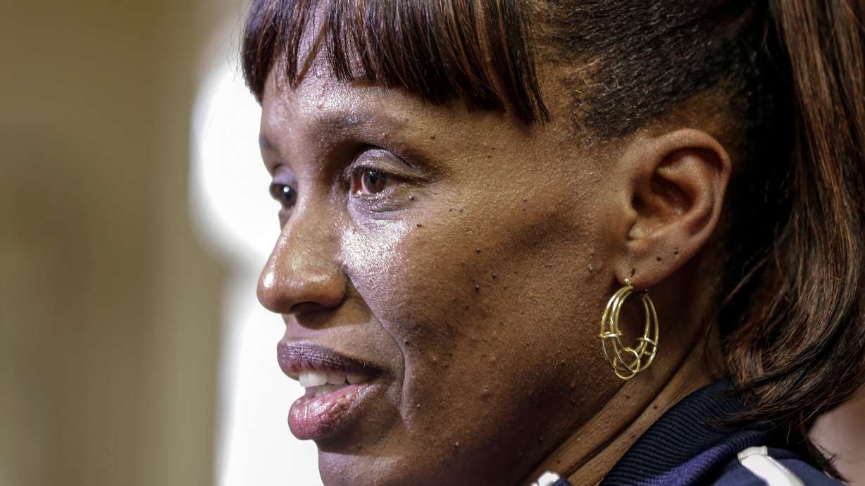 FILE - Four-time Olympian Jackie Joyner-Kersee speaks to reporters after addressing middle school students in Boys Town, Neb., May 7, 2013.