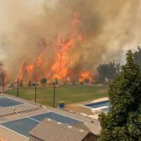 Washington Terrace fire torches 45 acres, forces home evacuations