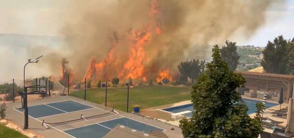 Washington Terrace fire torches 45 acres, forces home evacuations