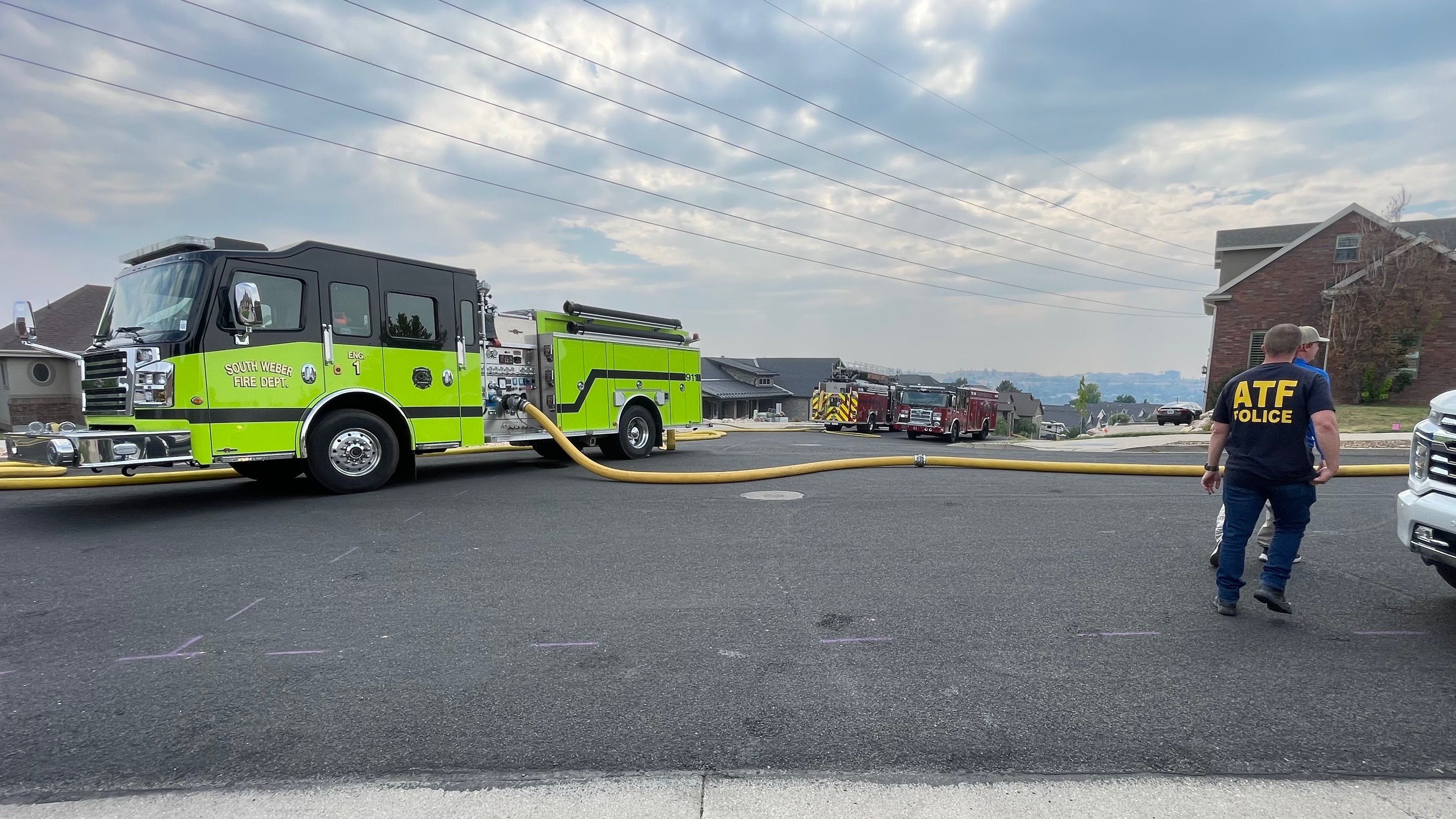 A fire in an undeveloped area south of Washington Terrace on Monday, July 27, 2026, torched around 75 acres, forced the evacuation of a nearby neighborhood and damaged a home. The photo shows a neighborhood near the fire zone.