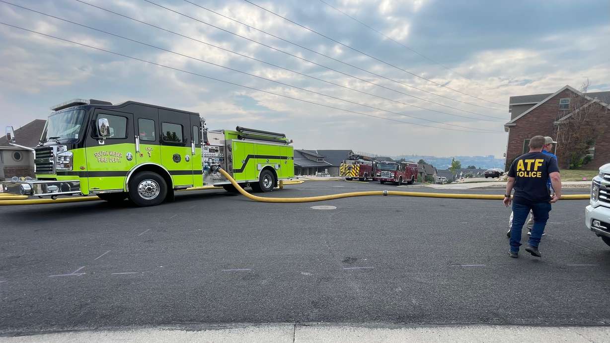A fire in an undeveloped area south of Washington Terrace on Monday, July 27, 2026, torched around 75 acres, forced the evacuation of a nearby neighborhood and damaged a home. The photo shows a neighborhood near the fire zone.