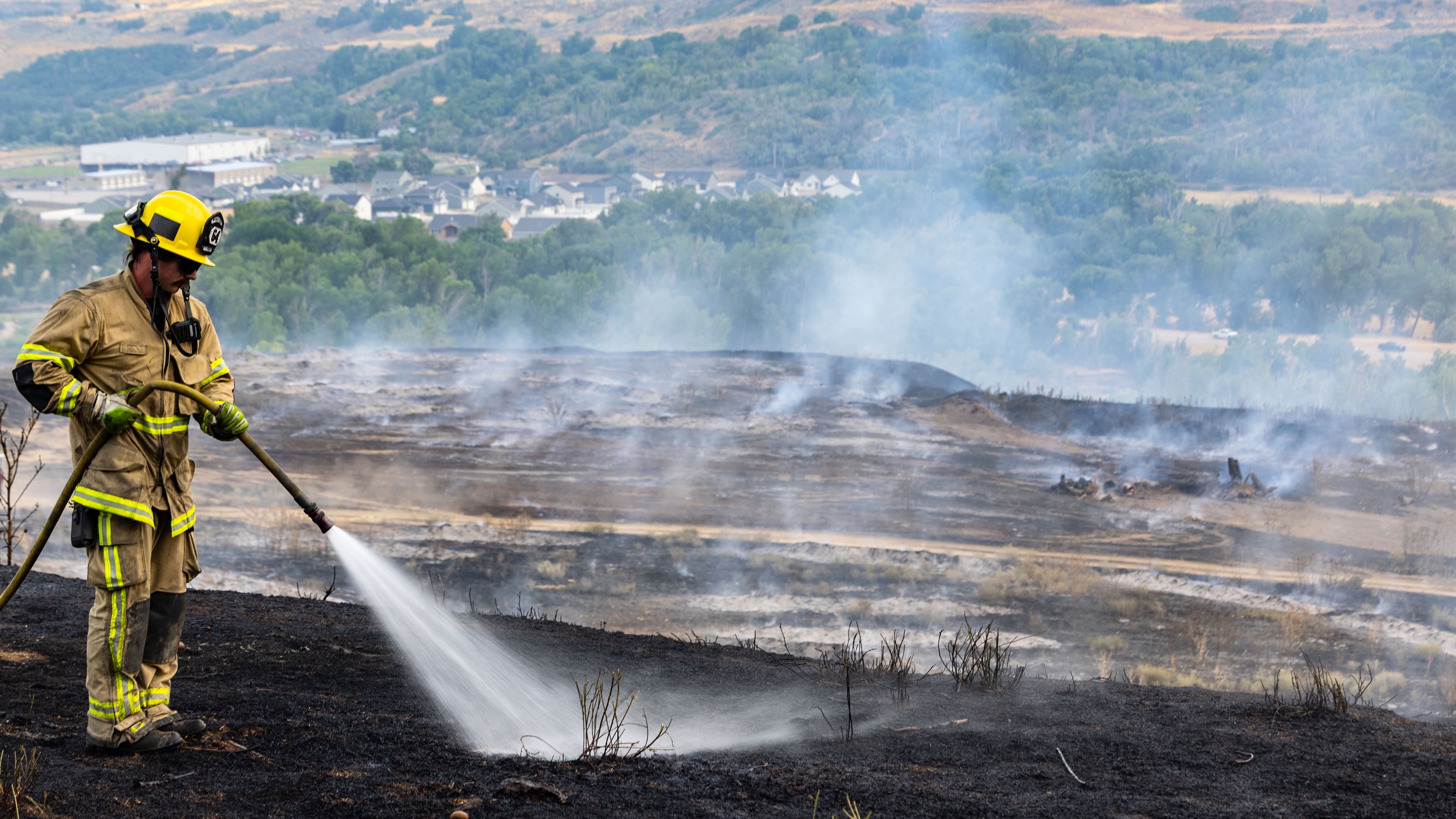 Washington Terrace fire torches 45 acres, forces home evacuations