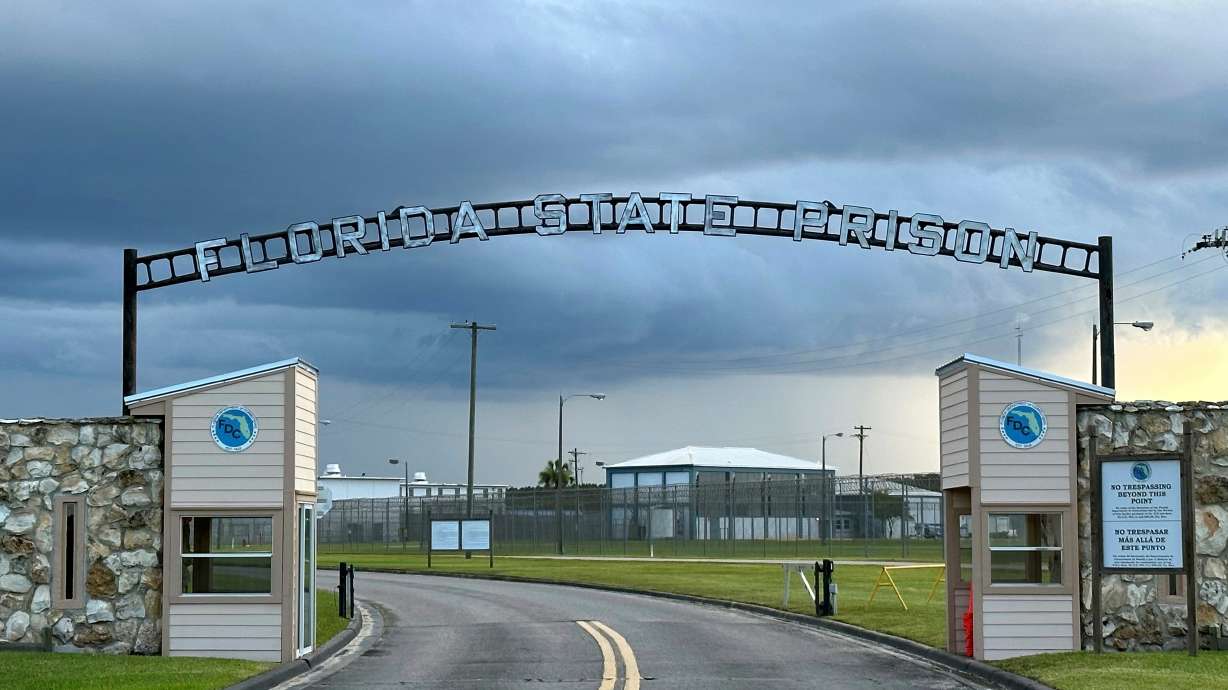 Clouds hover over the entrance of the Florida State Prison in Starke, Fla., Aug. 3, 2023. Florida is set to become the first state in nearly a decade to carry out two executions in a single day.