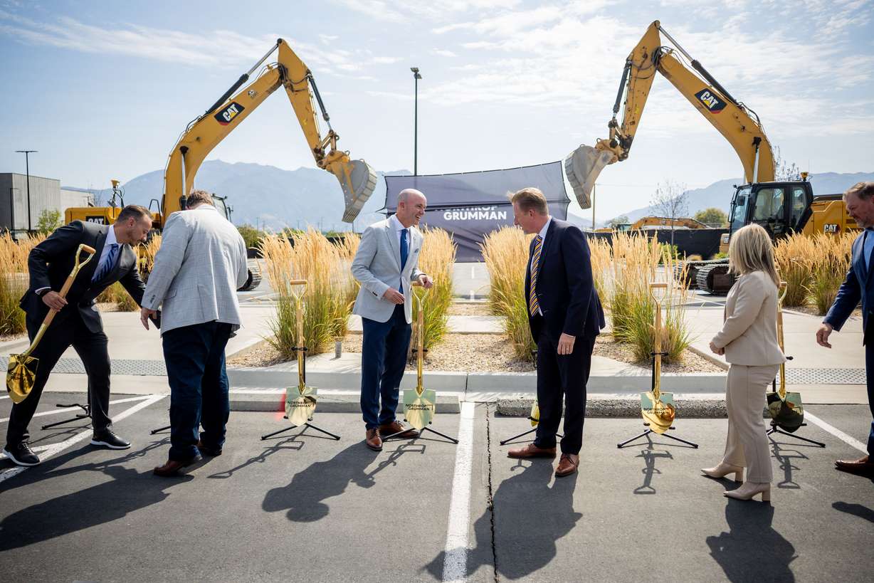 Gov. Spencer Cox, Sarah Willoughby, vice president and general manager of strategic deterrent systems at Northrop Grumman, and Benjamin R. Davies, corporate vice president and president at Northrop Grumman Defense Systems and others with construction machinery during the Roy Innovation Center Legacy Building groundbreaking at the Roy Innovation Center on July 14. Cox called Utah's recognition as the best state nationwide for the fourth year in a row as a testament to what the state represents.