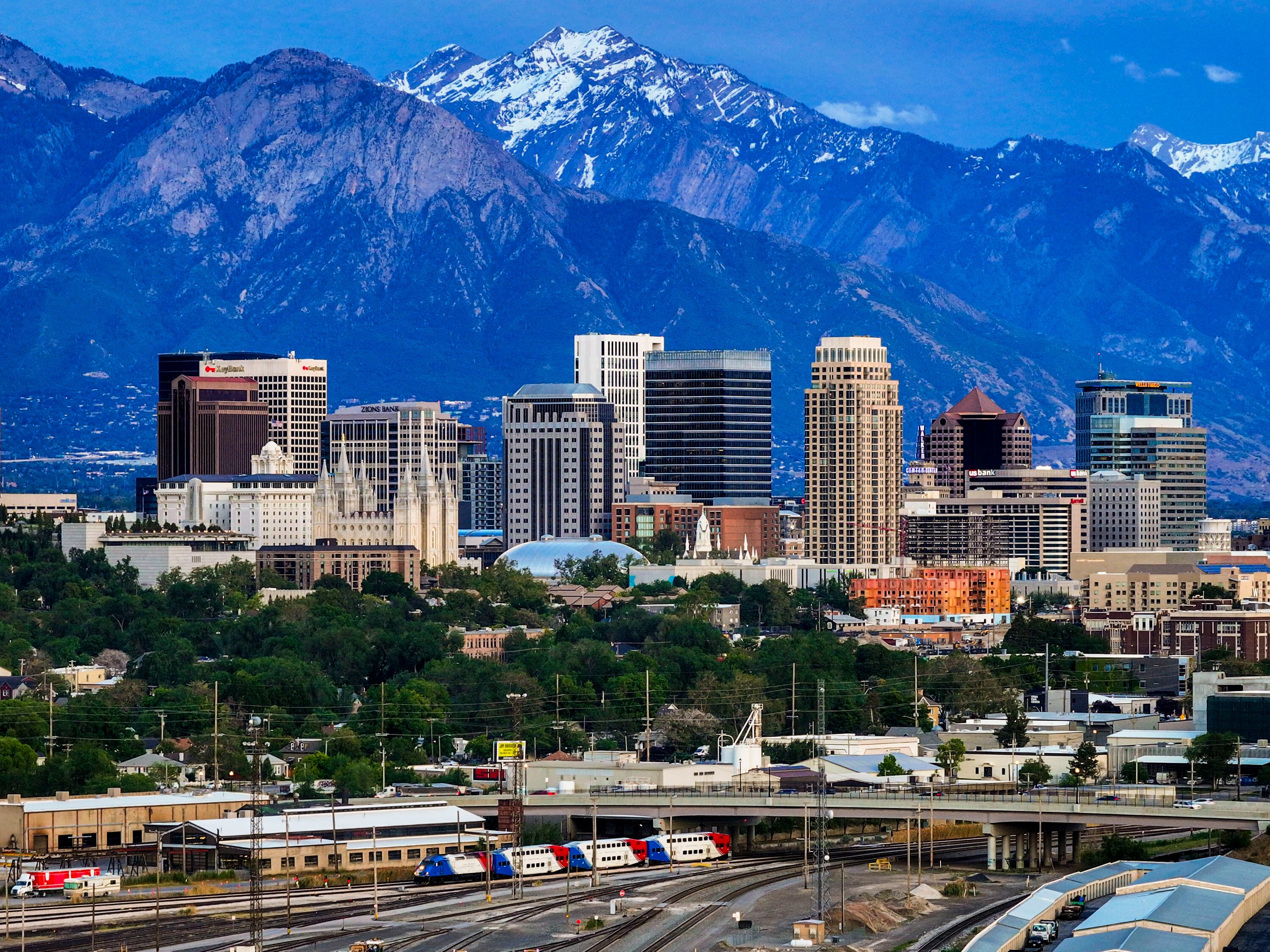 The Salt Lake City skyline in front of the Wasatch Mountains on May 26. Utah's economy has been fueled by an increase of young adults coming to the state, a new report from U.S. News & World Report showed.