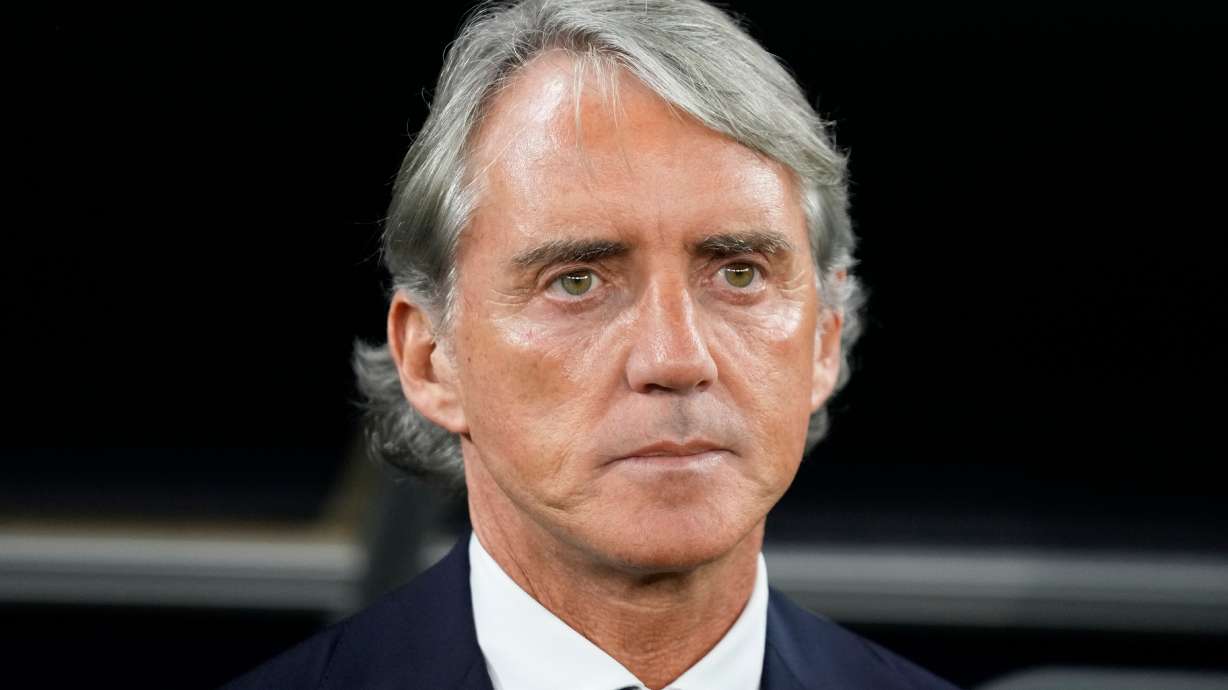FILE - Saudi Arabia's head coach Roberto Mancini stands for the national anthems ahead of the Asian Cup Group F soccer match between Saudi Arabia and Thailand at Education City Stadium, in Al Rayyan, Qatar, Thursday, Jan. 25, 2024.