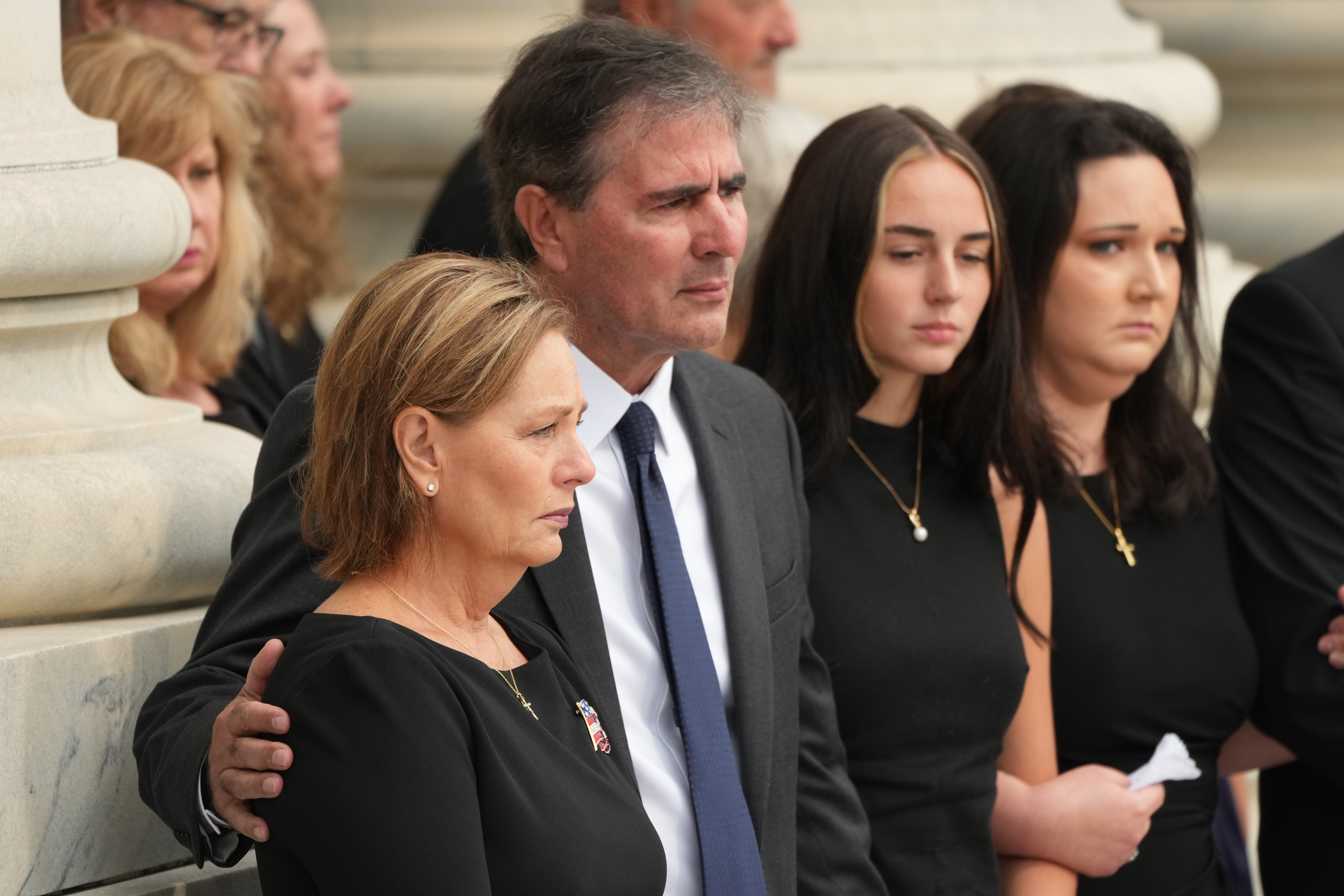 Sen. Darline Graham, R-S.C., and her husband Larry Nordone as a Armed Forces Body Bearer Team moves the casket of Sen. Lindsey Graham upon arrival for a Congressional tribute in the Rotunda of the Capitol, Tuesday, in Washington. Lindsey Graham's funeral will take place later Tuesday.