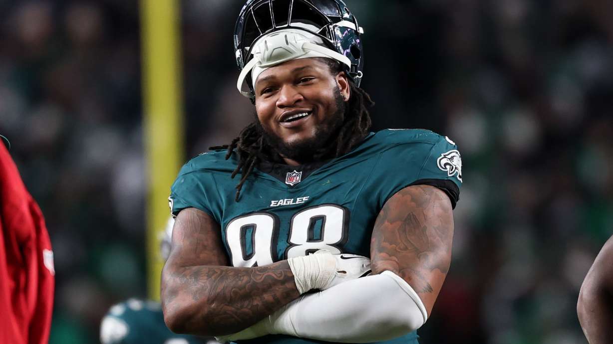 FILE - Philadelphia Eagles defensive tackle Jalen Carter (98) looks on between plays during the second half of an NFL wild card playoff football game against the San Francisco 49ers, Sunday, Jan. 11, 2026, in Philadelphia.