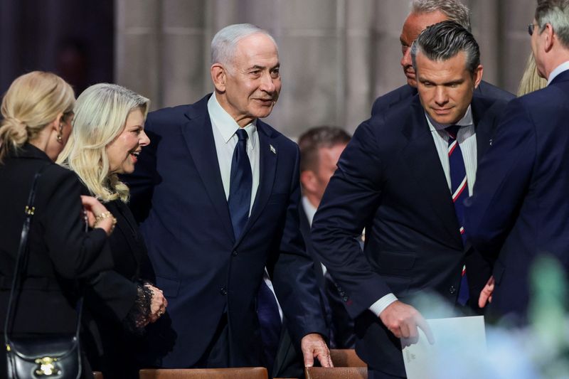 Israeli Prime Minister Benjamin Netanyahu with his wife Sara, Defense Secretary Pete Hegseth and other officials on the day of the funeral service for Sen. Lindsey Graham, R-S.C., at Washington National Cathedral in Washington, Tuesday. Netanyahu had a closed-door meeting with President Donald Trump prior to the funeral.