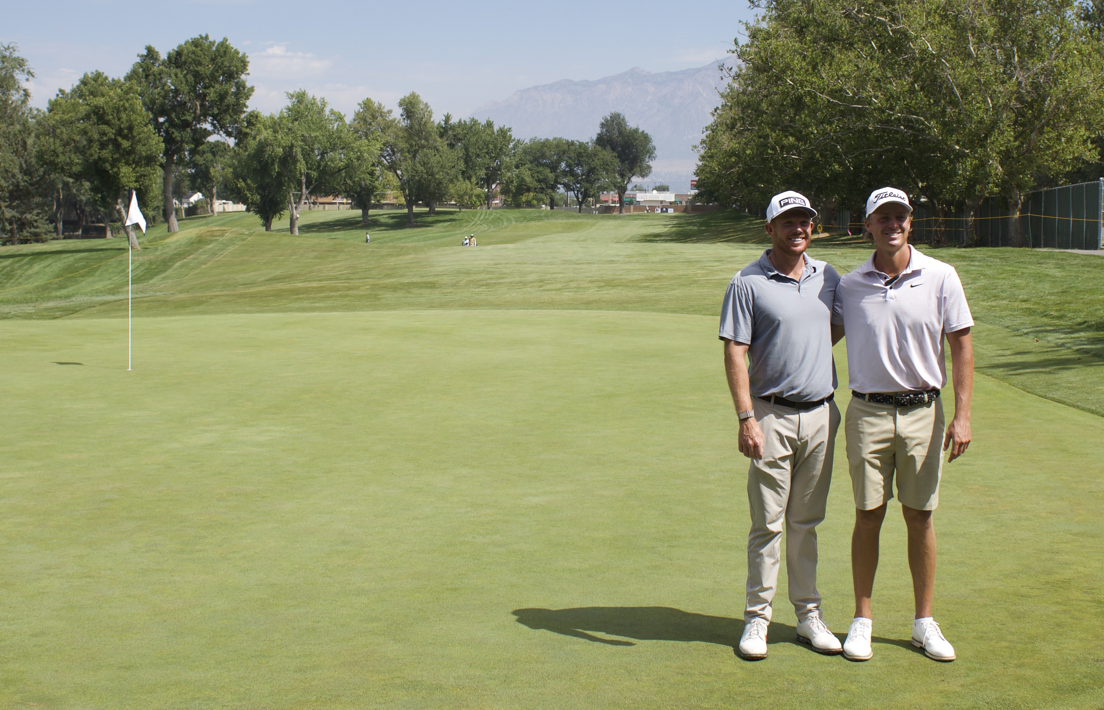 Former Weber High golfer Connor Howe and University of Utah alum Mitchell Schow on the No. 2 green during a practice round, Tuesday, July 28, 2026 at the Korn Ferry Tour's Utah Championship at Ogden Golf and Country Club.