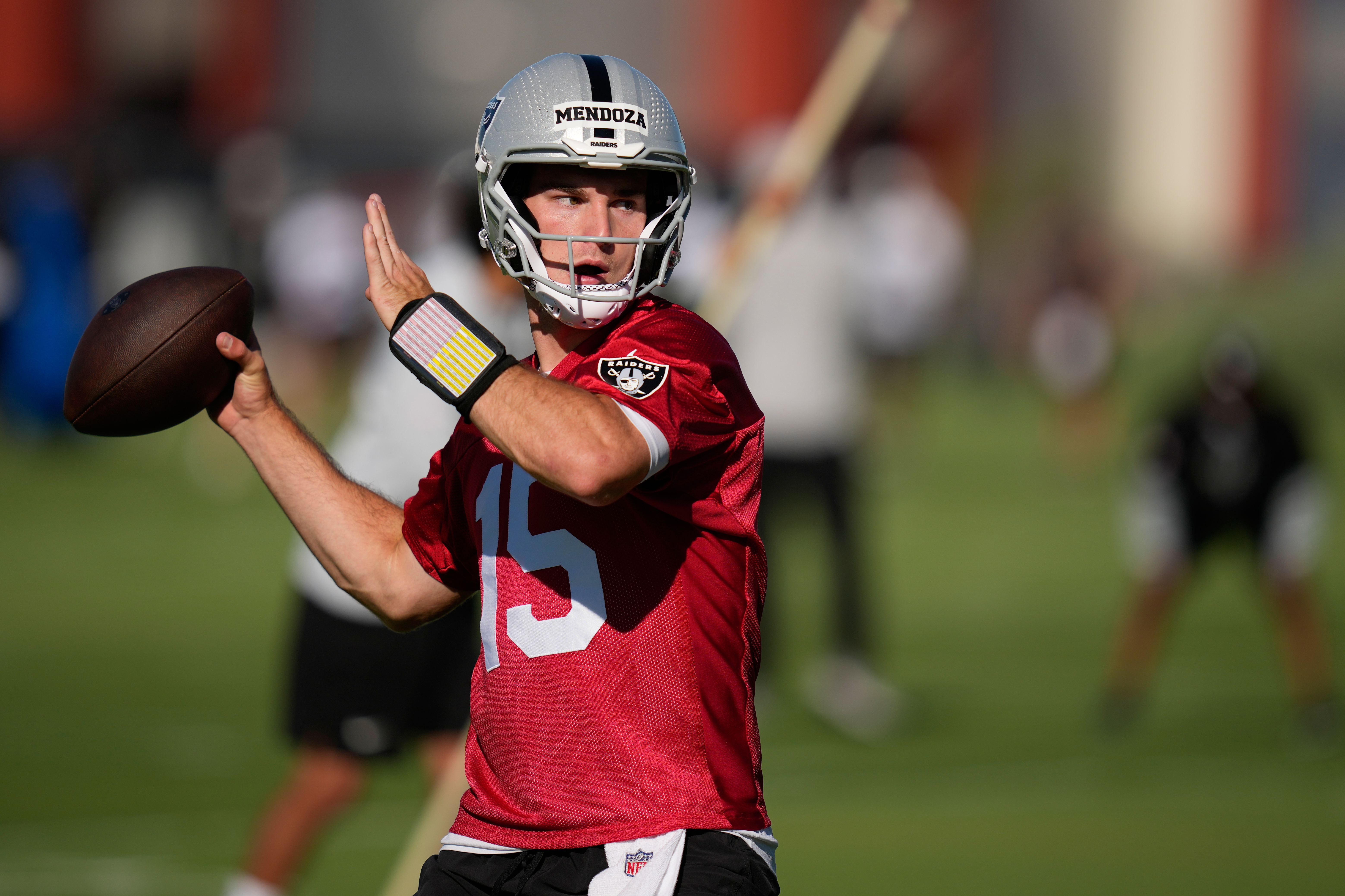 FILE - Las Vegas Raiders quarterback Fernando Mendoza throws during the NFL football team's practice Wednesday, June 10, 2026, in Henderson, Nev. 