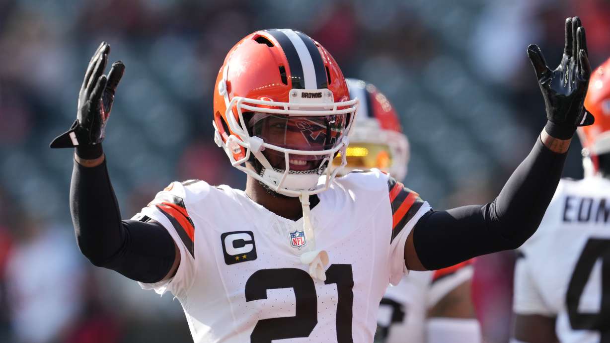 FILE - Cleveland Browns cornerback Denzel Ward warms up before an NFL football game against the Cincinnati Bengals, Jan. 4, 2026, in Cincinnati.