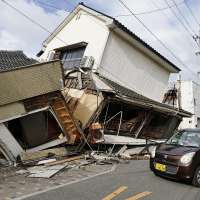 Rescuers search for survivors after 7.1 quake kills 18 in southwestern Japan