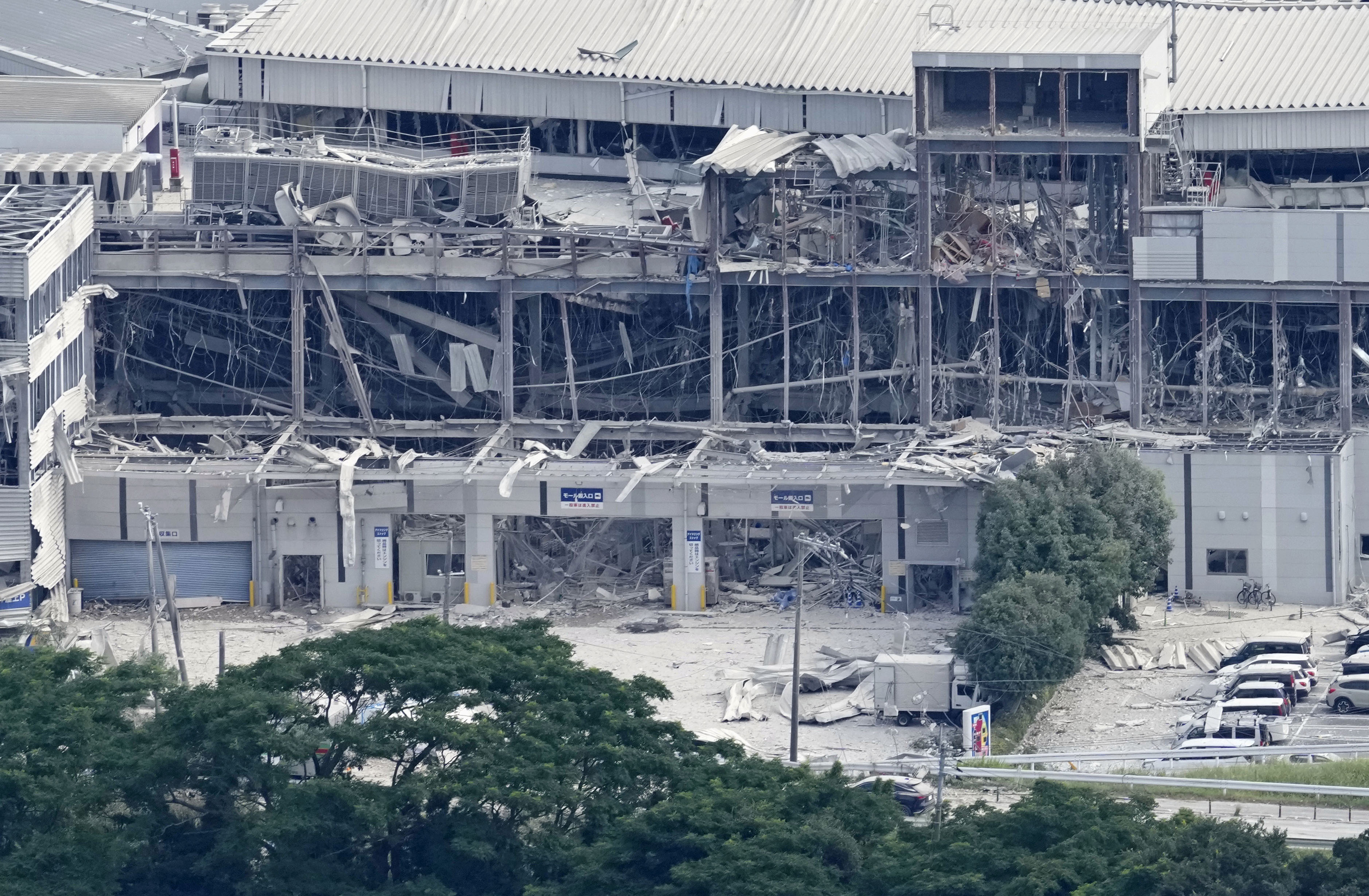 The AEON Mall destroyed by an explosion following an earthquake, in Kashima, Kumamoto prefecture, Japan, on Wednesday. Three people remain missing following the explosion.