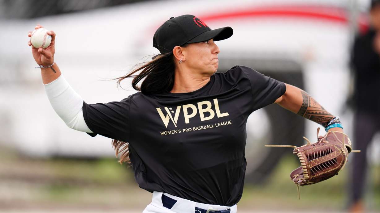 FILE - Kelsie Whitmore pitches during a Women's Pro Baseball League practice, Wednesday, March 18, 2026, in Fort Myers, Fla.