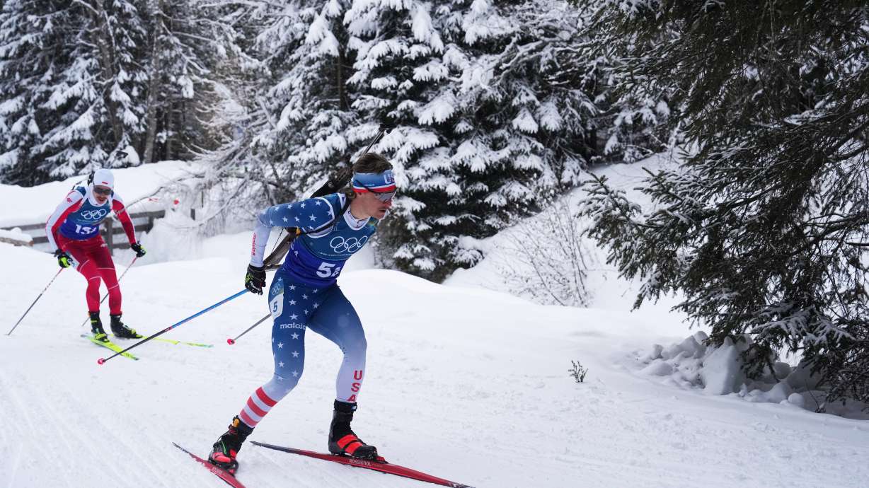 FILE - Campbell Wright, of the United States, right, competes in the men's 4x7.5-kilometer relay biathlon race at the 2026 Winter Olympics in Anterselva, Italy, Feb. 17, 2026.