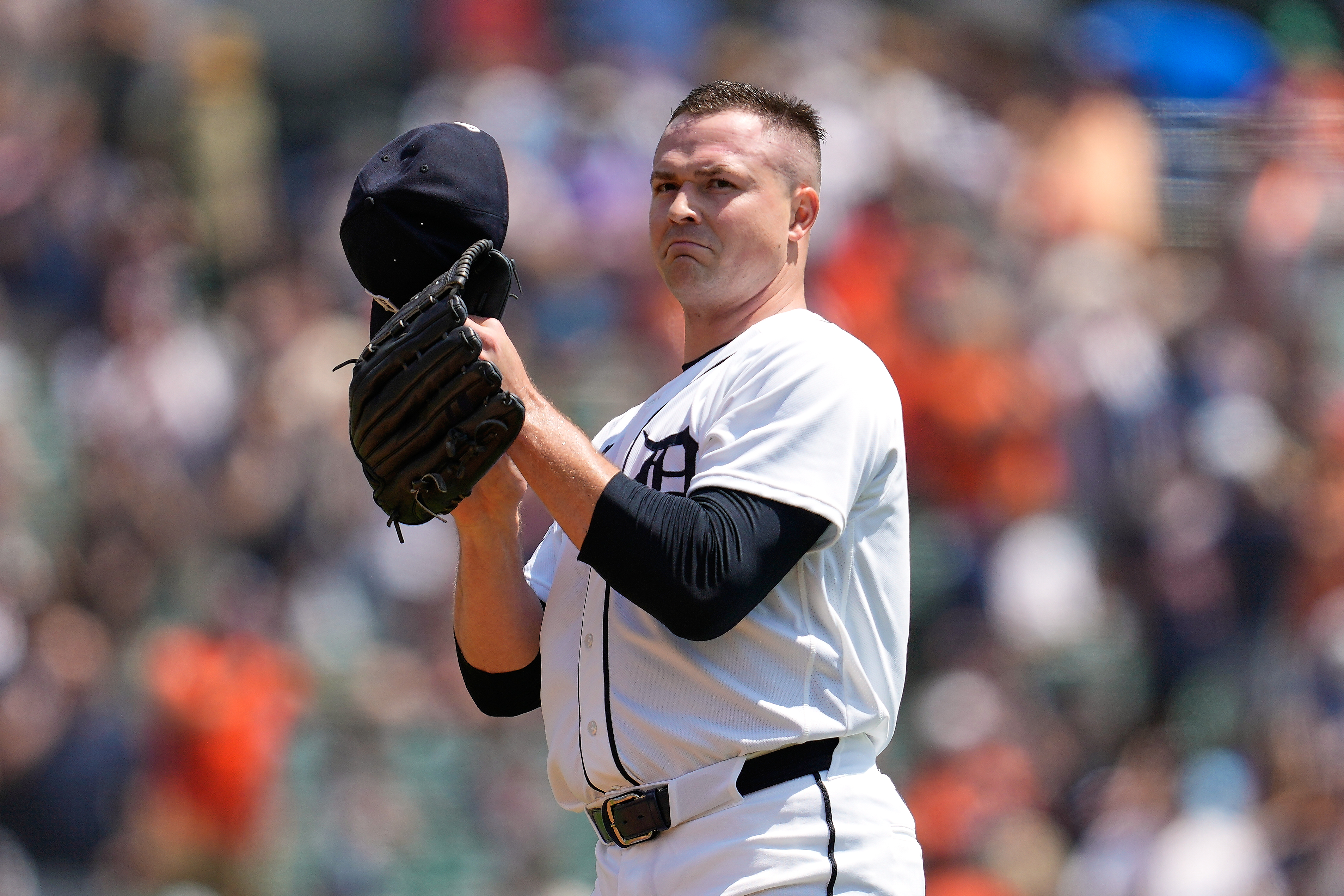 Detroit Tigers pitcher Tarik Skubal tips his hat after his 1,000th career strikeout during the first inning of a baseball game against the Baltimore Orioles Wednesday, July 29, 2026, in Detroit. 