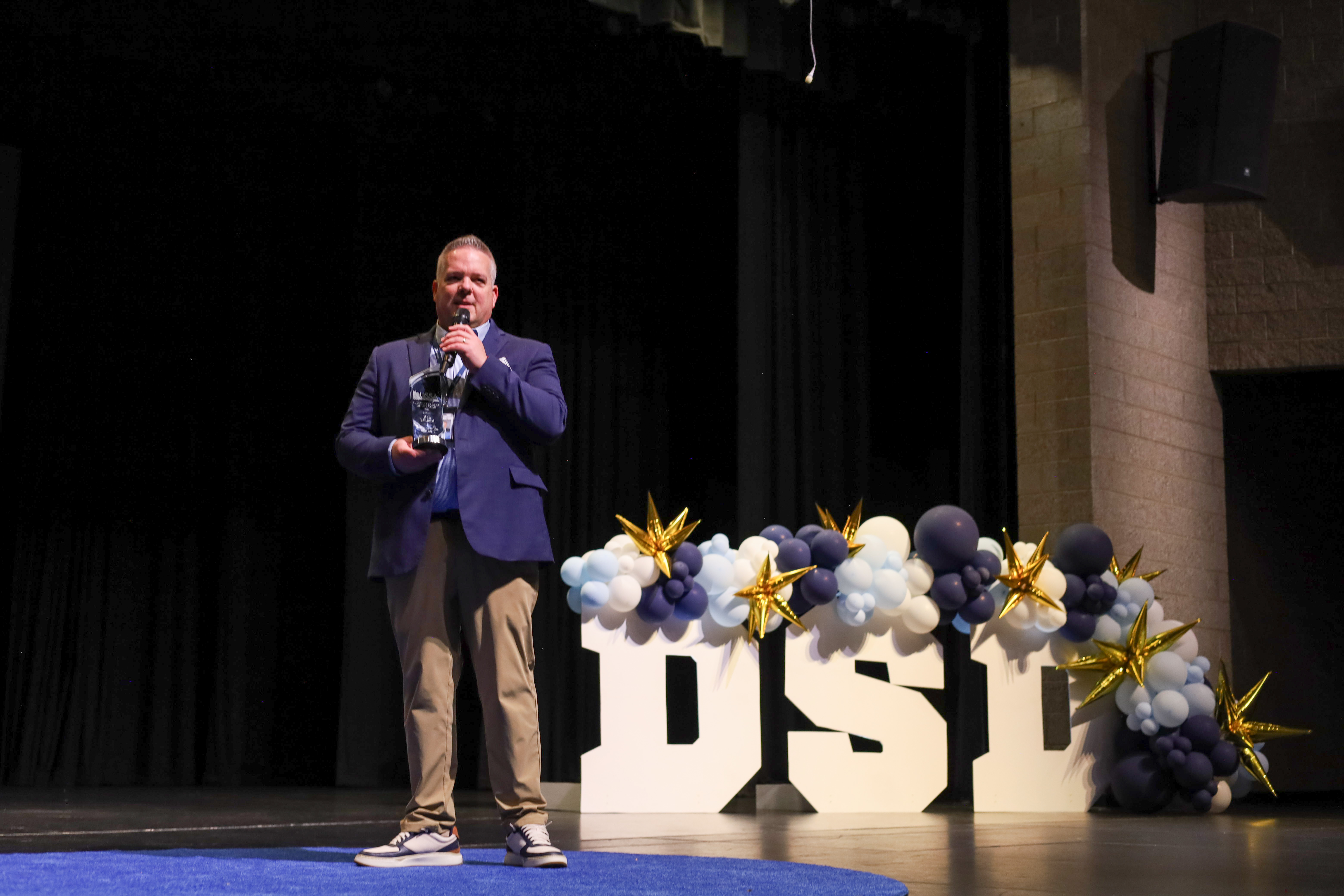 Keynote speaker surprised with Superintendent of the Year award