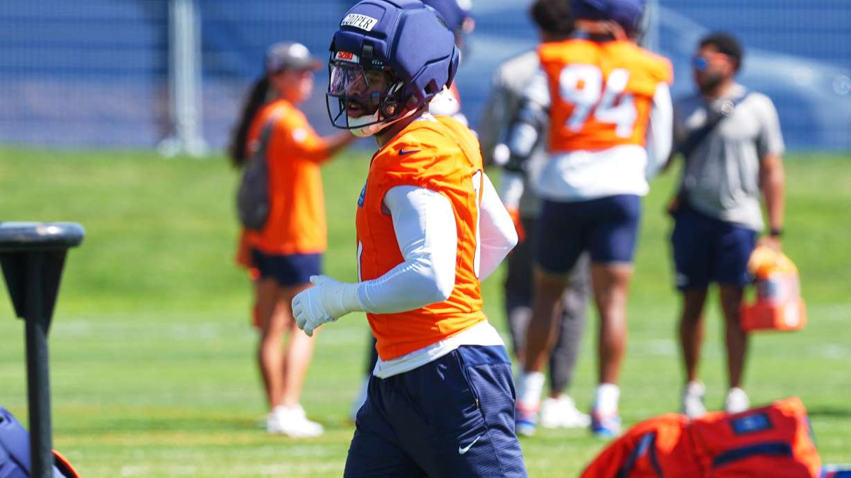 Denver Broncos linebacker Jonathon Cooper takes part in drills during a practice at the team's NFL football training camp, Wednesday, July 29, 2026, in Centennial, Colo.