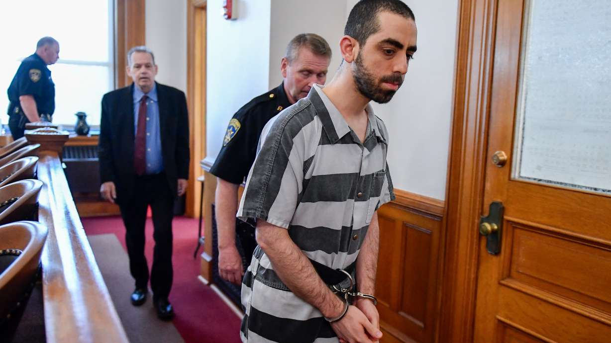 Hadi Matar walks in to the Chautauqua County court in Mayville, N.Y., May, 16, 2025. Matar has been convicted of federal terrorism charges in the 2022 stabbing of author Salman Rushdie.