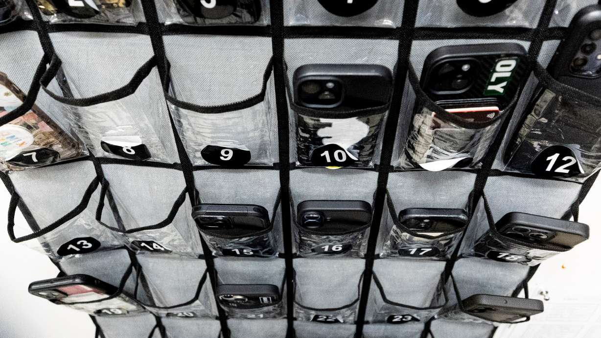 Students’ cellphones are stored during a class at Olympus High School in Holladay on Jan. 8. A new cellphone law passed by the 2026 Utah Legislature will be in effect when K-12 students go back to school in the coming weeks.