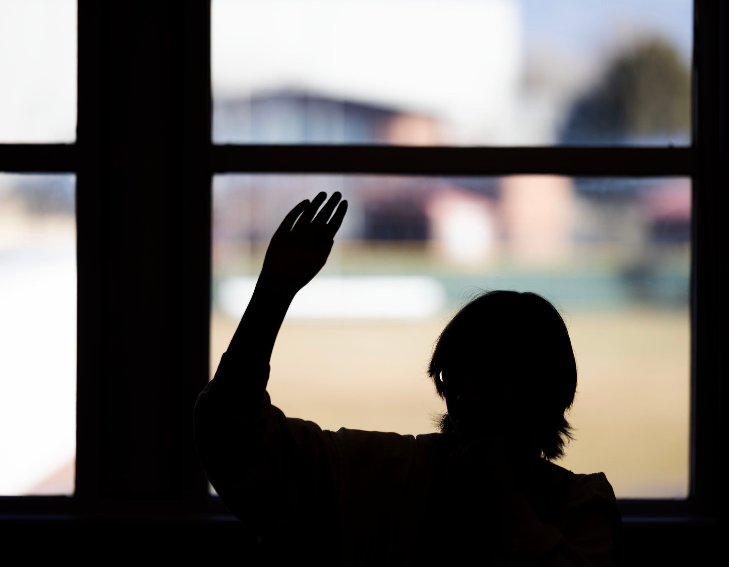 A student raises their hand at Jordan High School in Sandy on Jan. 15.