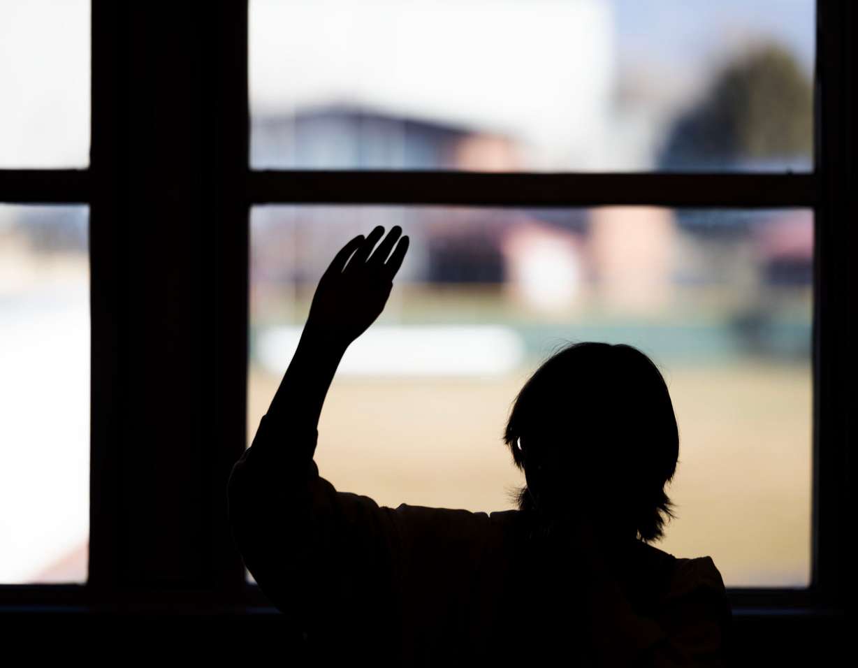 A student raises their hand at Jordan High School in Sandy on Jan. 15.