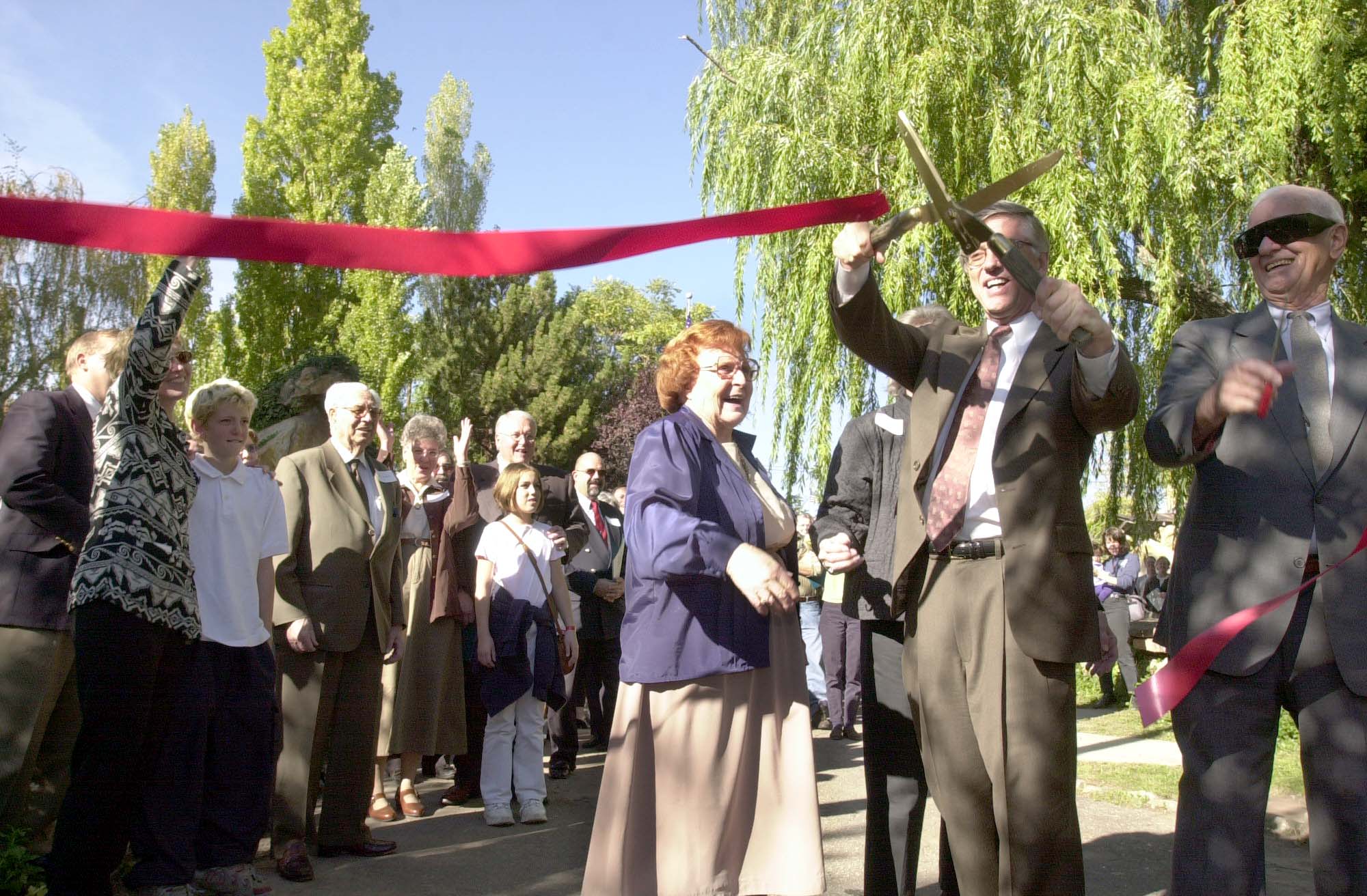 From left: Hortense Child Smith, Mary Lee Peters, Rocky Anderson and Robert Bliss cut the ribbon at the Gilgal Sculpture Garden during its opening ceremonies on Oct. 18, 2000.