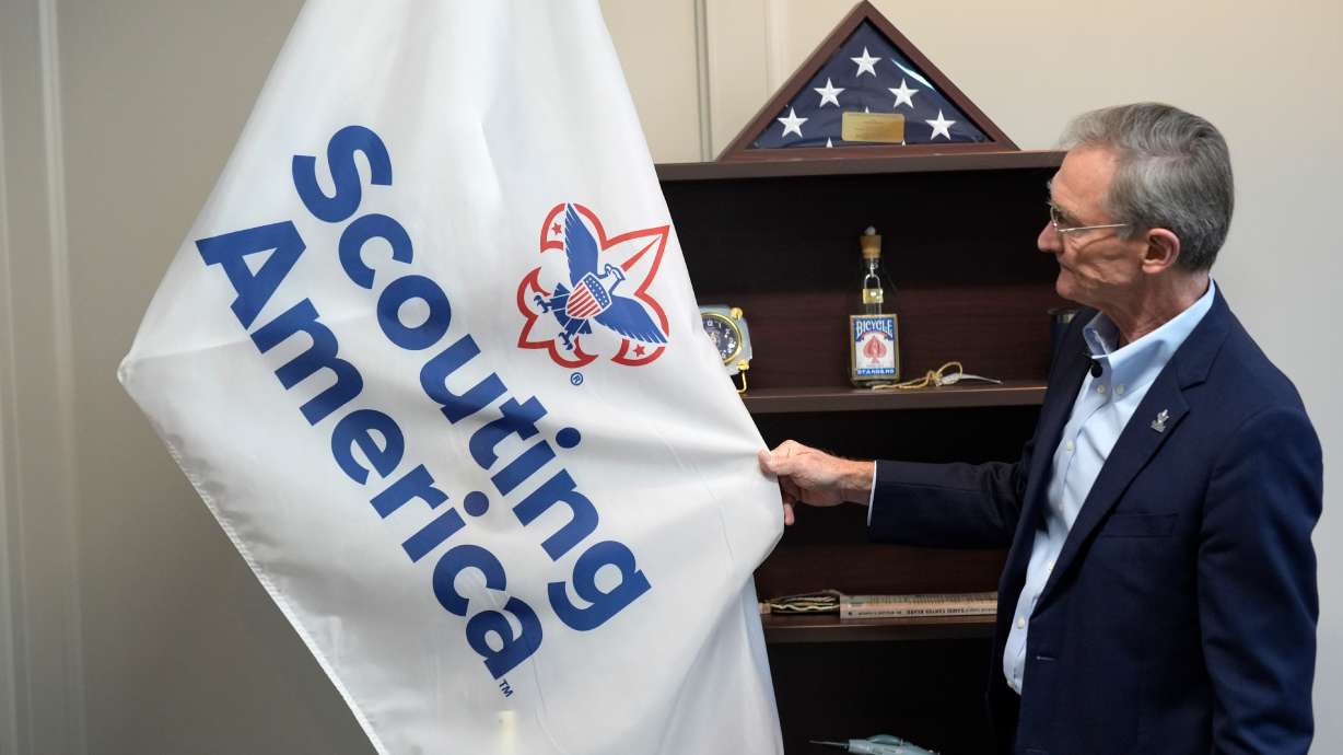 Roger Krone, chief executive officer of Scouting America, describes the design of the organization's flag in Irving, Texas, Feb. 5, 2025. One of Scouting America's biggest gatherings has eliminated dedicated spaces as the organization faces pressure from the Pentagon to pull back diversity efforts.