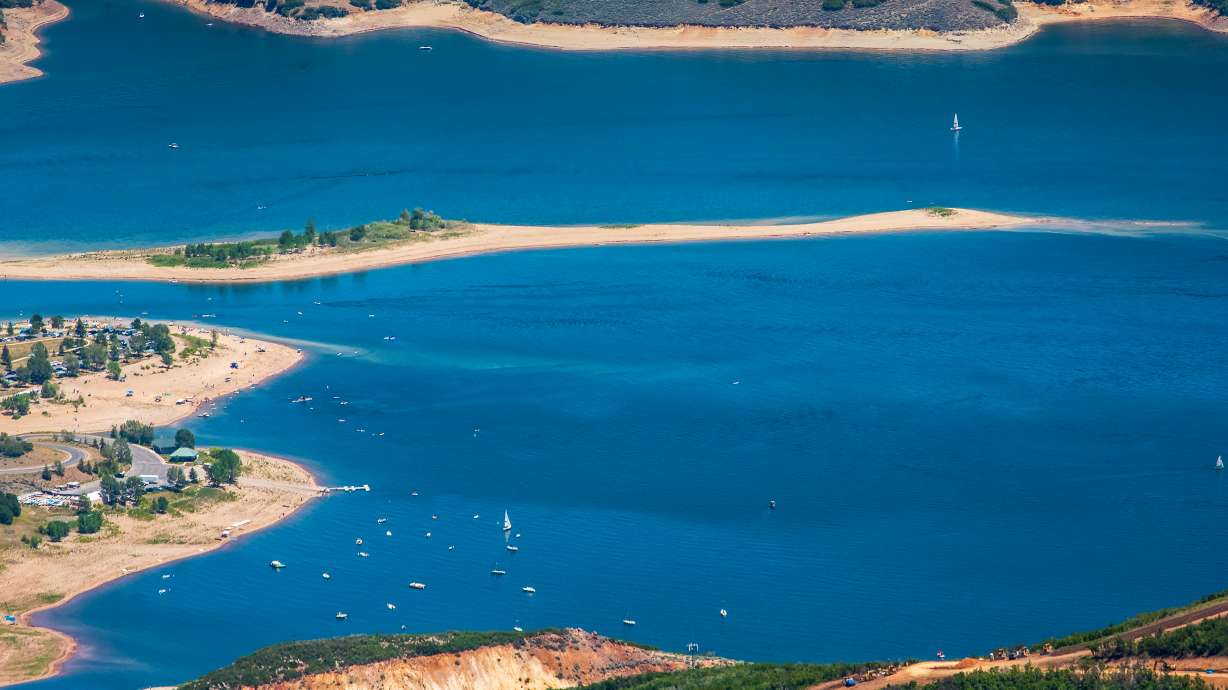 People recreate at Jordanelle Reservoir on June 14. Utah's reservoir system tumbled in July, but monsoons have benefitted the state's mountain soils.
