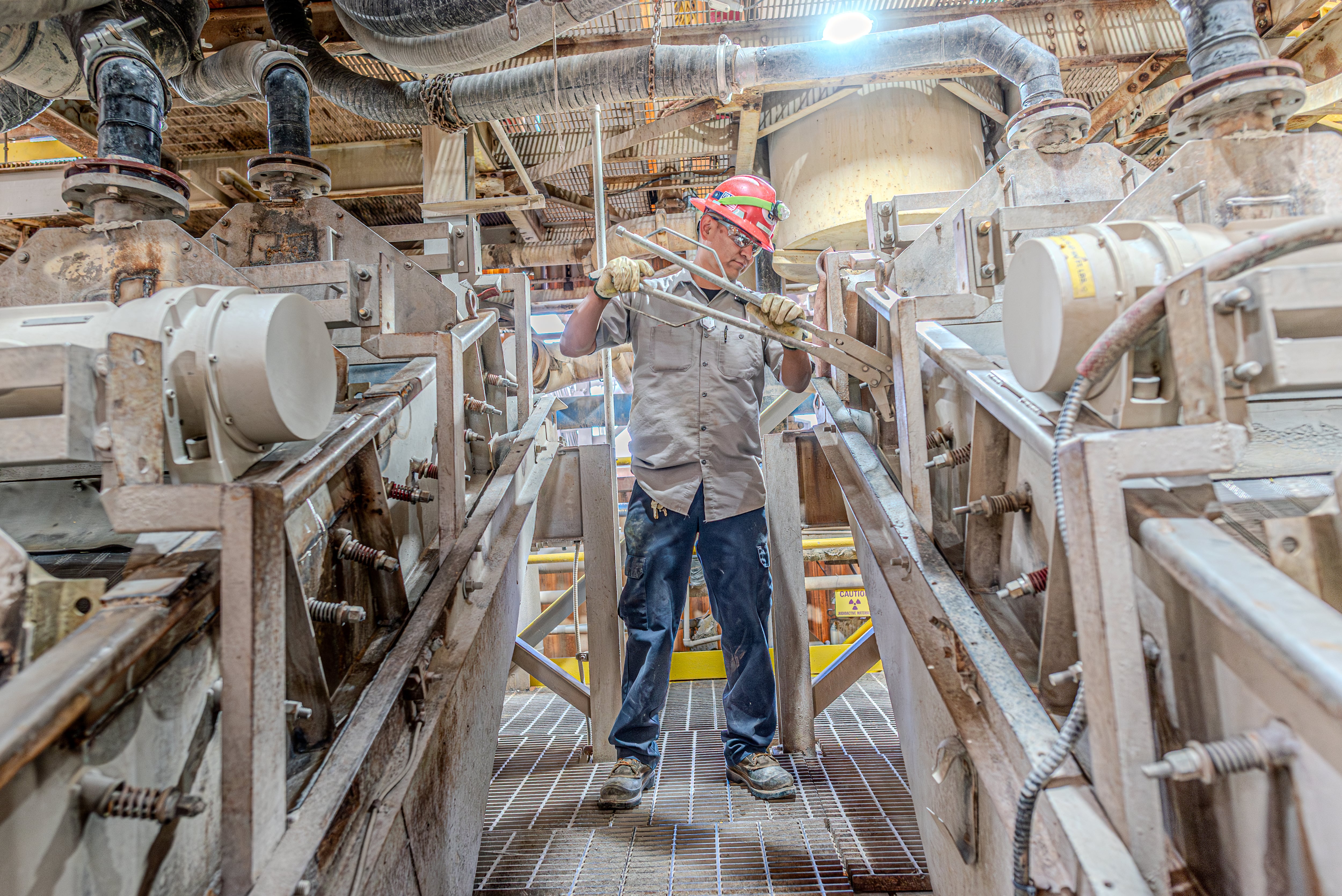 A worker on the uranium circuit at the White Mesa Mill in April of 2025, located in San Juan County, Utah.