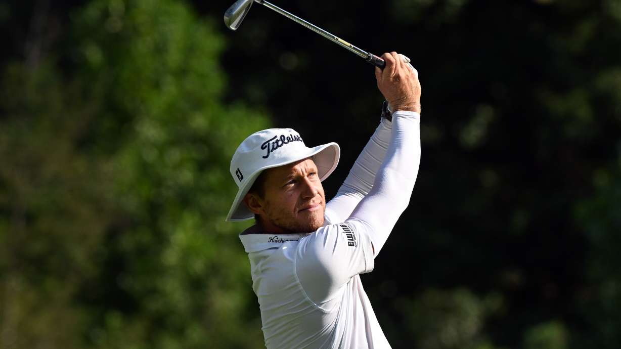 Peter Malnati hits from the 11th tee during the first round of the Rocket Classic golf tournament at the Detroit Golf Club, Thursday, July 30, 2026, in Detroit.