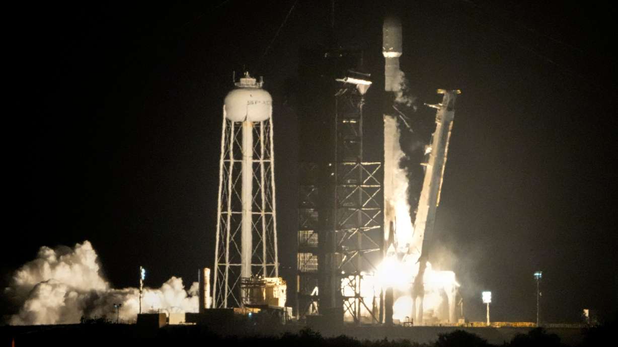 A SpaceX Falcon 9 rocket lifts off from pad 39A with a payload of a pair of lunar landers at the Kennedy Space Center in Cape Canaveral, Florida, Jan. 15, 2025. A drifting SpaceX rocket is on a collision course with the moon after launching a pair of lunar landers more than a year ago.