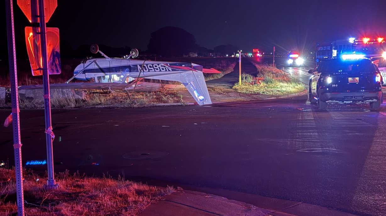 A small plane crashed in Layton Thursday night, landing upside down. Two people were hospitalized afterward.