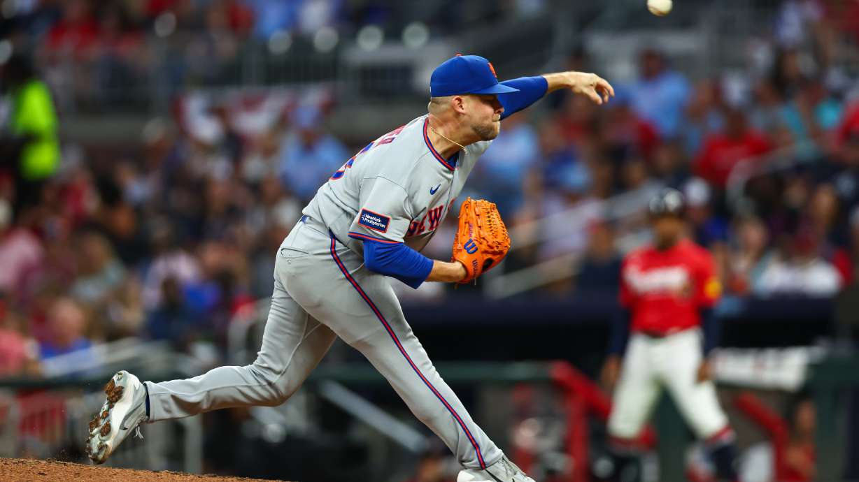New York Mets pitcher A.J. Minter delivers in the fifth inning of a baseball game against the Atlanta Braves, Friday, July 3, 2026, in Atlanta.
