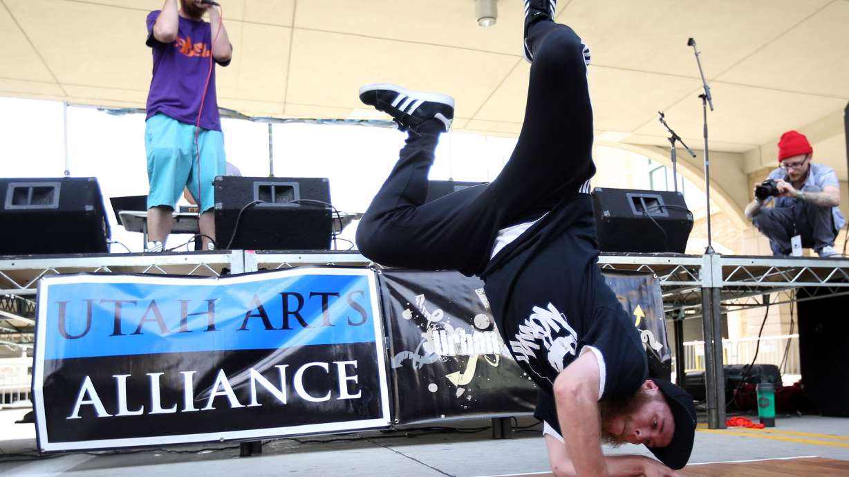Kielan Waldo breakdances at the Urban Arts Festival at The Gateway in Salt Lake City on July 18, 2015.
