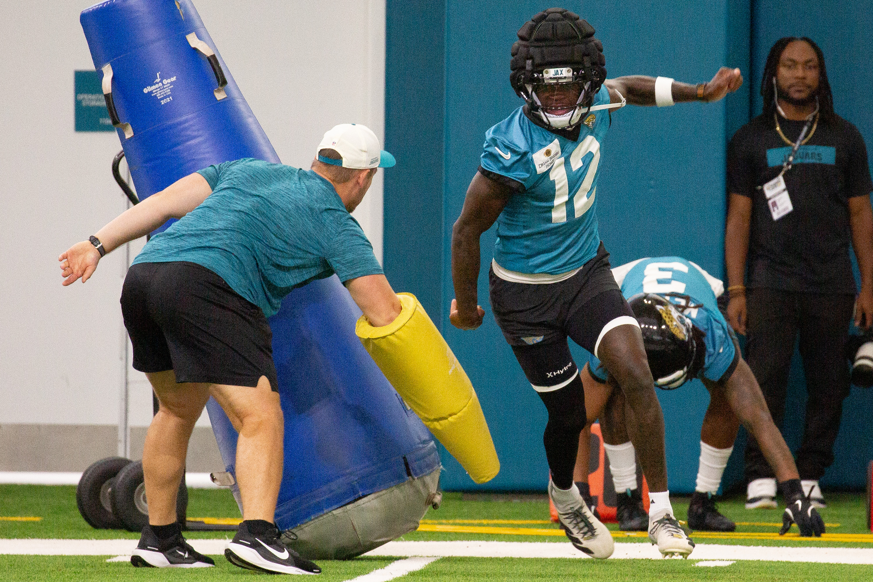 Jacksonville Jaguars wide receiver and cornerback Travis Hunter (12) particpates in drills during practice at the team's NFL football training camp, Thursday, July 30, 2026, in Jacksonville, Fla. 