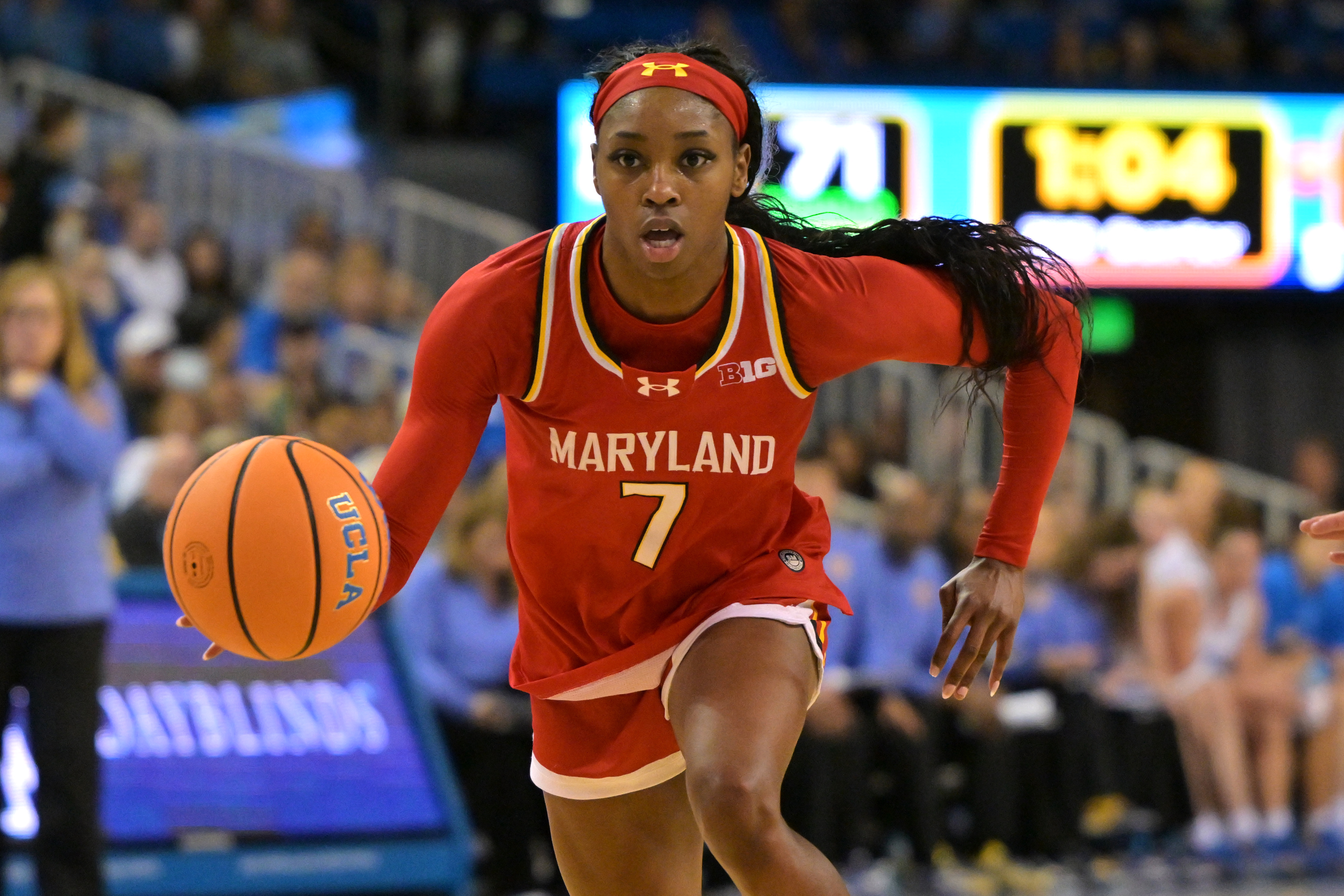 FILE - Maryland guard Oluchi Okananwa handles the ball during the second half of an NCAA college basketball game against UCLA, Jan. 18, 2026, in Los Angeles. 