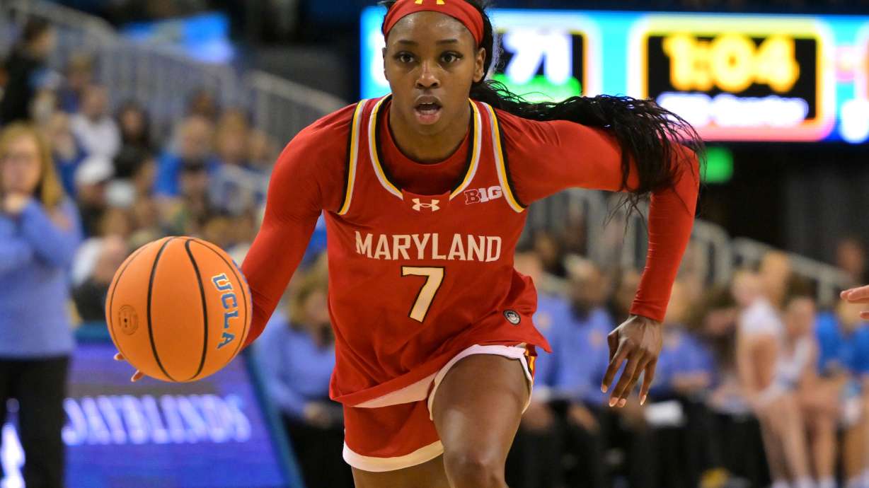 FILE - Maryland guard Oluchi Okananwa handles the ball during the second half of an NCAA college basketball game against UCLA, Jan. 18, 2026, in Los Angeles.