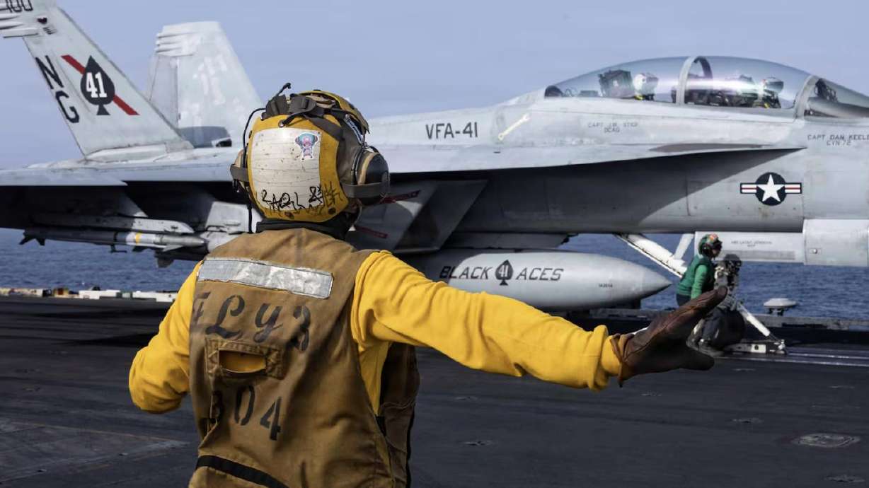 An F/A-18F Super Hornet, attached to Strike Fighter Squadron 41, prepares to launch from the flight deck of Nimitz-class aircraft carrier USS Abraham Lincoln on June 25. Abraham Lincoln is deployed to the U.S. 5th Fleet area of operations to support maritime security and stability in the Middle East.
