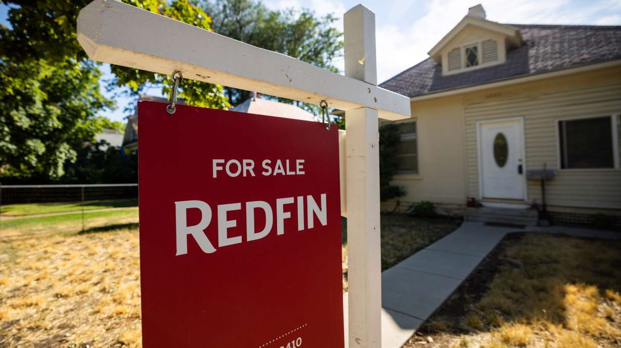 A “for sale” sign in the 9th and 9th neighborhood in Salt Lake City on July 23. Pending home sales in the U.S. are down, recently hitting the lowest level since early April.