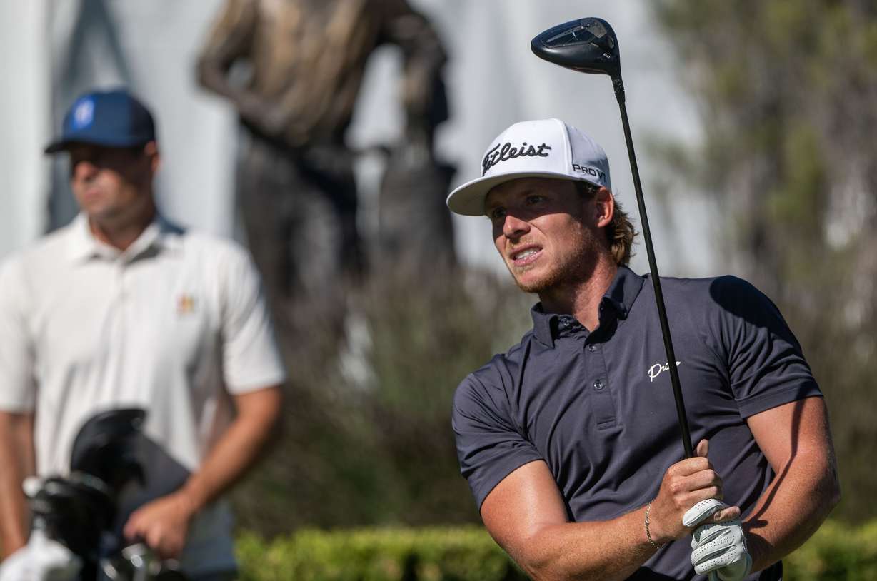 Carson Lundell watches his tee shot as hits on the 10th tee box as he and other golfers compete in the second round of the Utah Championship at the Ogden Golf & Country Club on Friday, July 31, 2026.