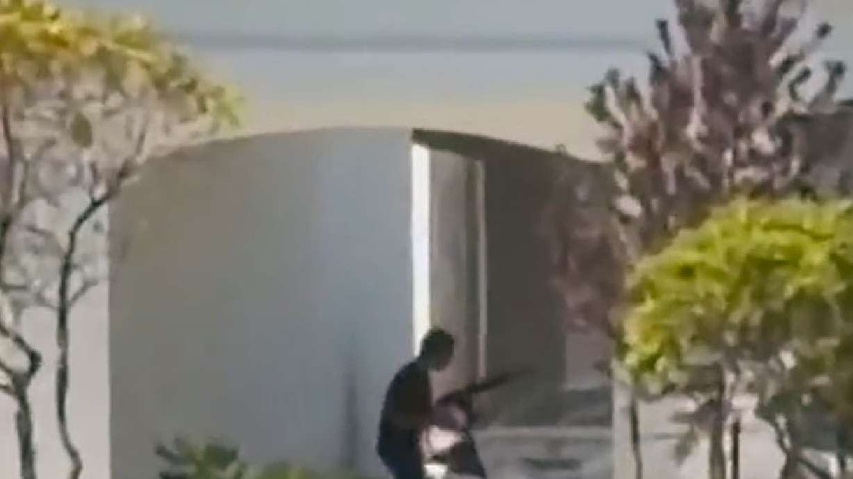 This still image captured from video by a witness shows the scene of a shooting that started at an In-N-Out Burger restaurant on Saturday in Twin Falls, Idaho.
