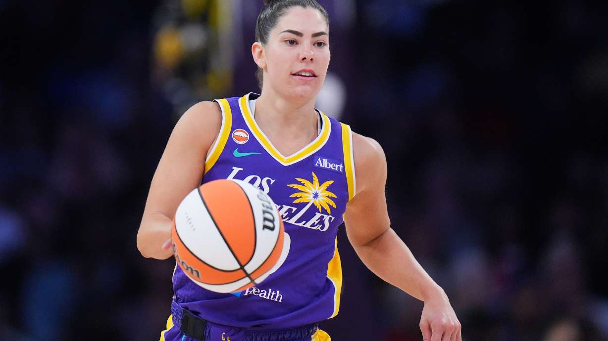FILE - Los Angeles Sparks guard Kelsey Plum dribbles during the second half of a WNBA basketball game against the Indiana Fever, May 13, 2026, in Los Angeles.