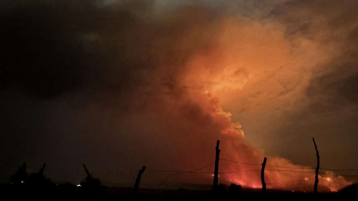 Smoke rises from the Widemouth 2 Fire near Meadow, Saturday. The images were captured between approximately 11:45 a.m. and noon.