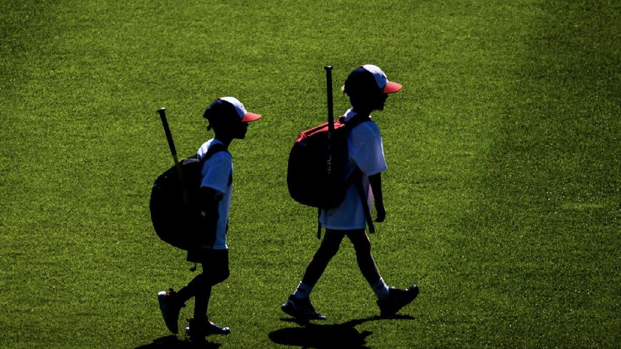 Youth participants walk to a different station as part of activities during a kickoff event for Utah Youth Sports Giving Day held at The Ballpark at America First Square in South Jordan on June 5.