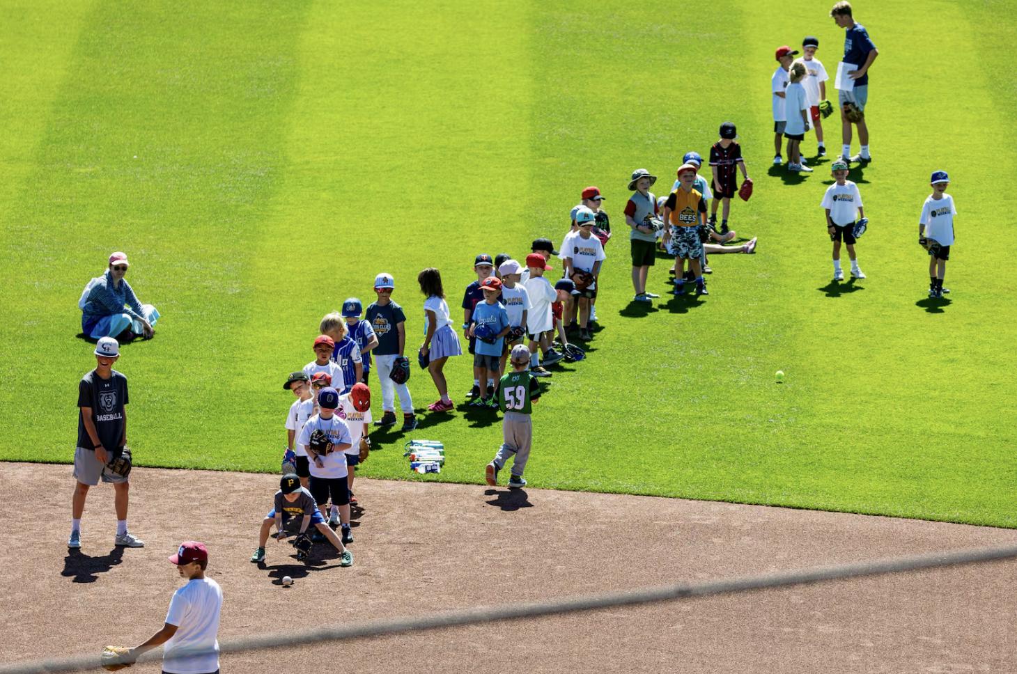 Youth participants practice fielding ground balls as part of a kick-off event for Utah Youth Sports Giving Day held at The Ballpark at America First Square in South Jordan on June 5.