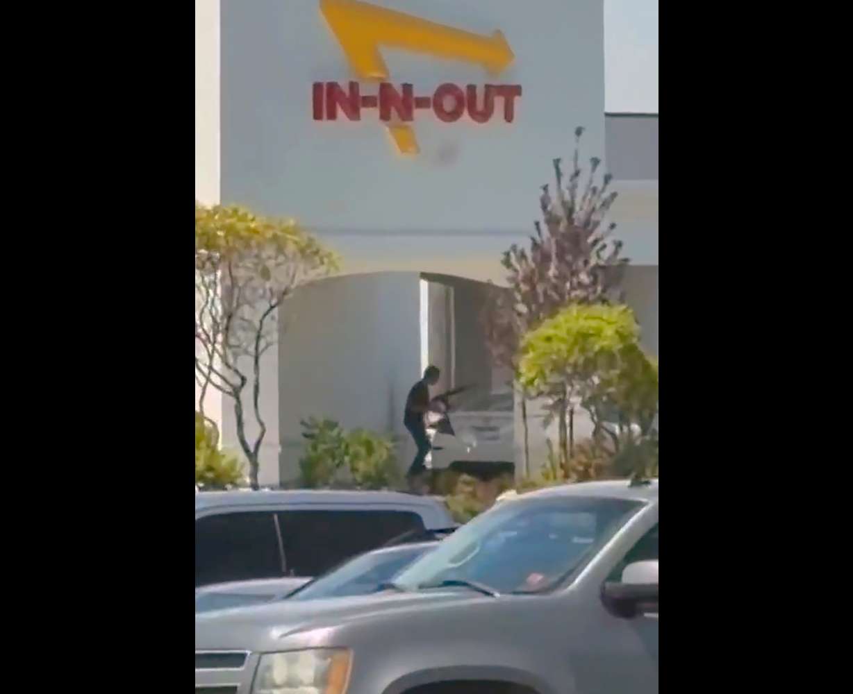 This still image captured from video by a witness shows the scene of a shooting that started at an In-N-Out Burger restaurant on Saturday in Twin Falls, Idaho.