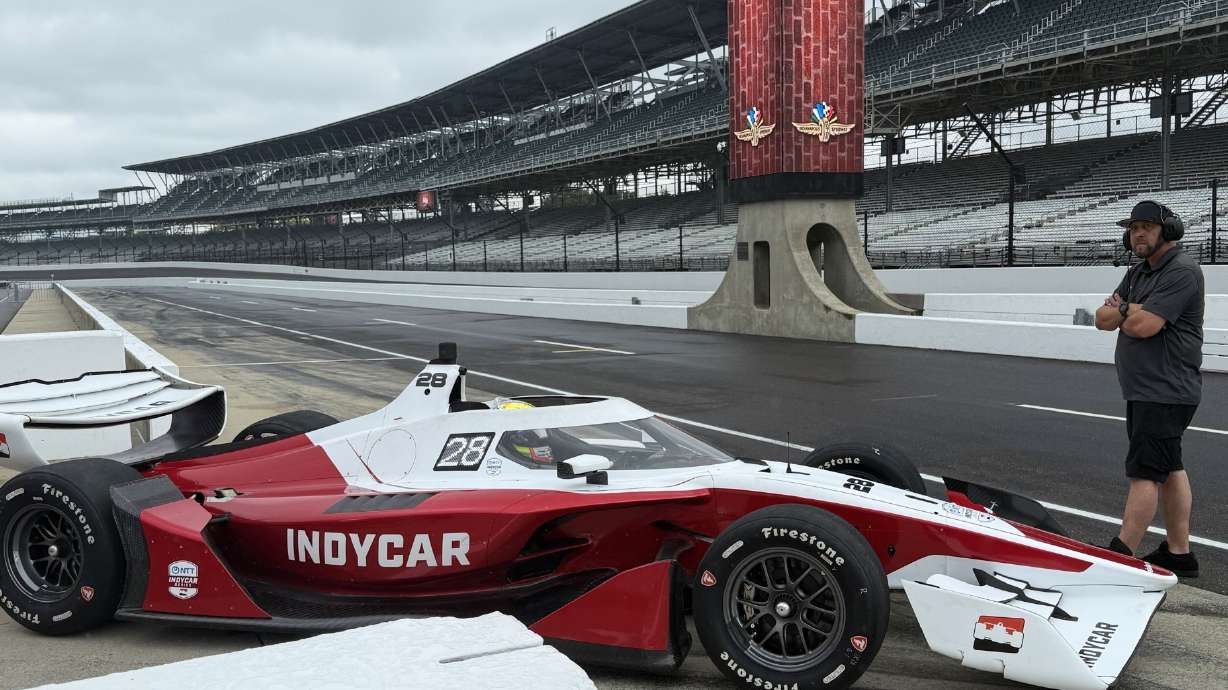 Reigning IndyCar champion Alex Palou drives into the pit lane to test a new IndyCar model, Sunday, Aug. 2, 2026, at Indianapolis Motor Speedway in Indianapolis.