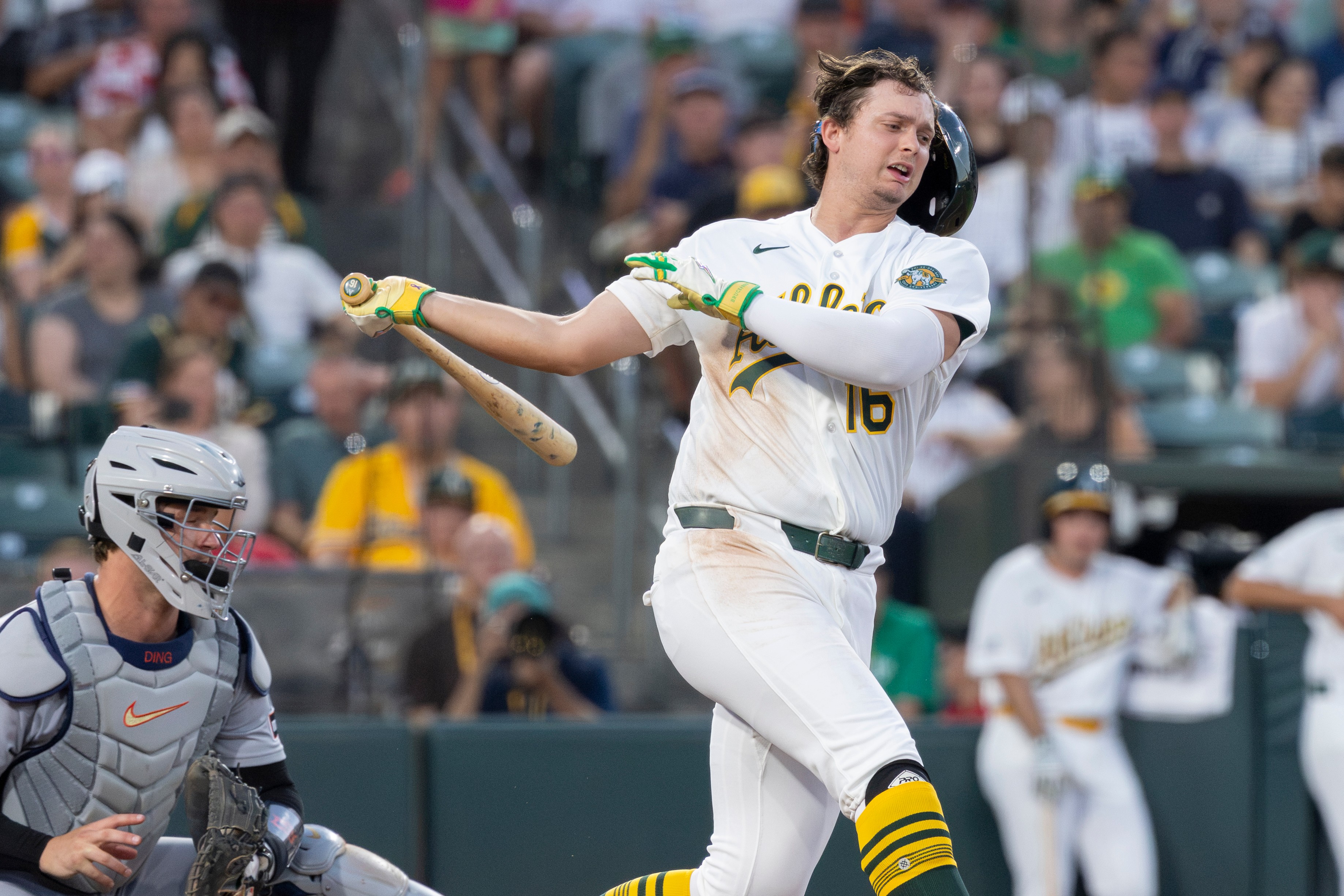 Athletics' Nick Kurtz loses his batting helmet on a swing during the fifth inning of a baseball game against the Detroit Tigers, Friday, July 31, 2026, in West Sacramento, Calif. 